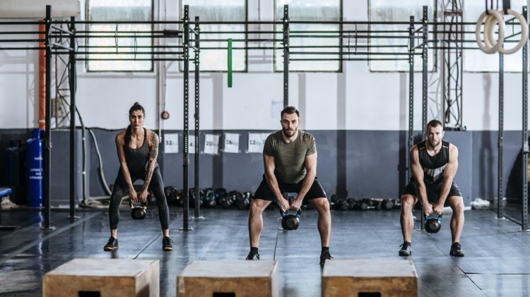 People Doing Workouts at Gym