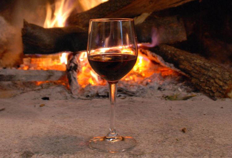 Fireplace and glass of wine